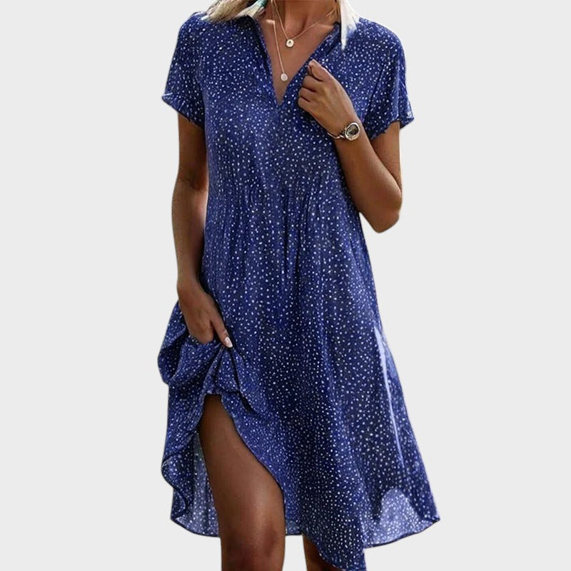 Vestido midi de verano para mujer, estampado de lunares. Diseño fresco y fluido, ideal para días cálidos.