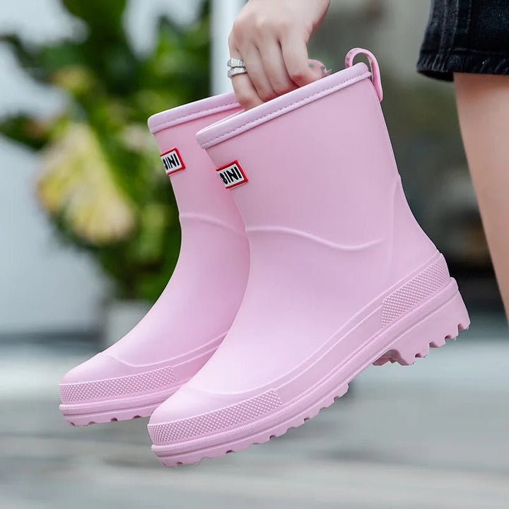 Botas impermeables de media caña para mujer, calzado duradero para lluvia y aventuras.