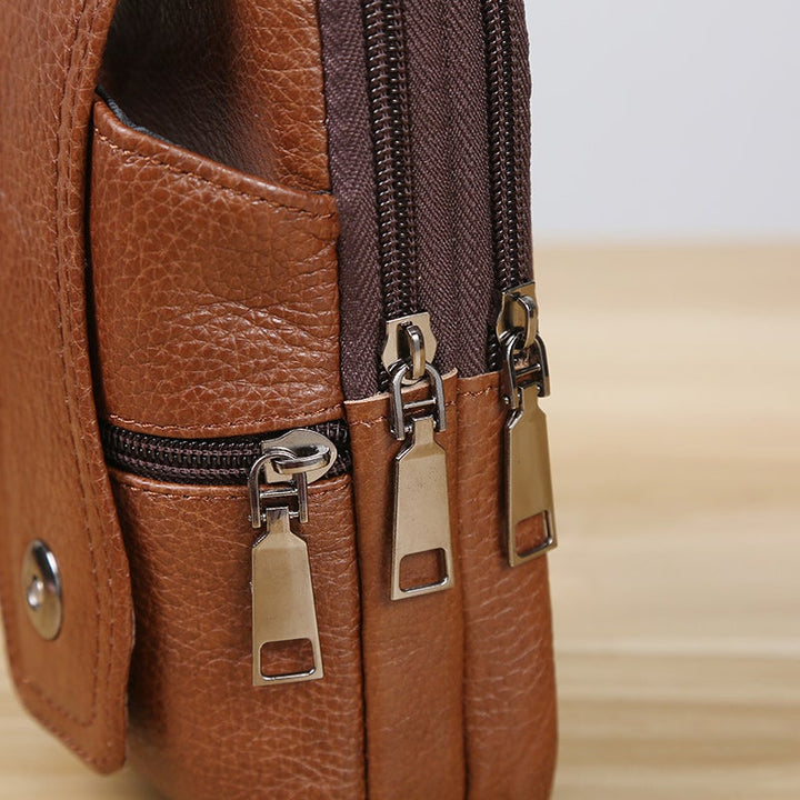 Bandolera vintage de cuero para hombre, perfecta para llevar lo esencial con estilo casual.
