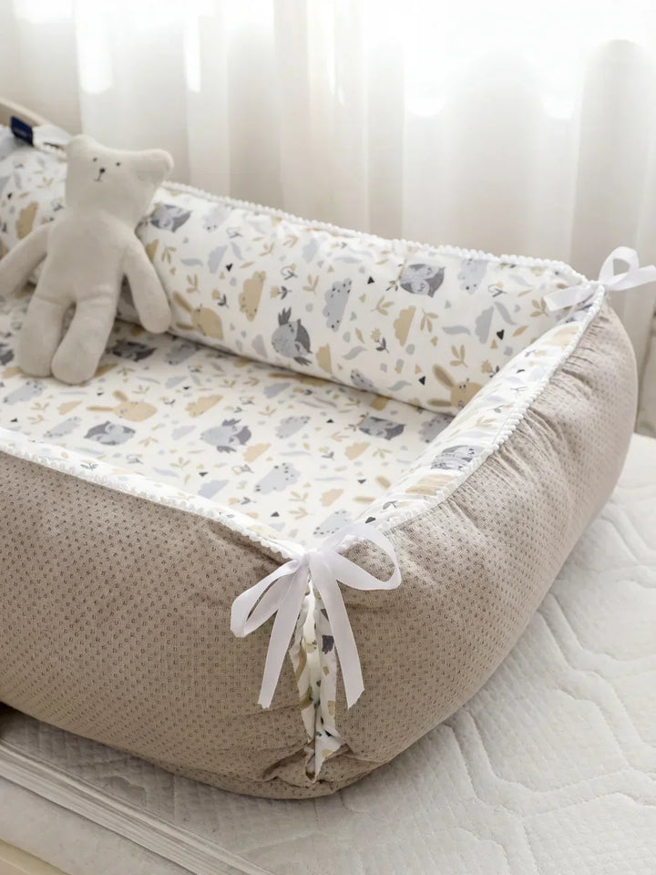 Nido extralargo para bebés, con cojín cervical. Algodón natural, ideal para sueño seguro y descanso.