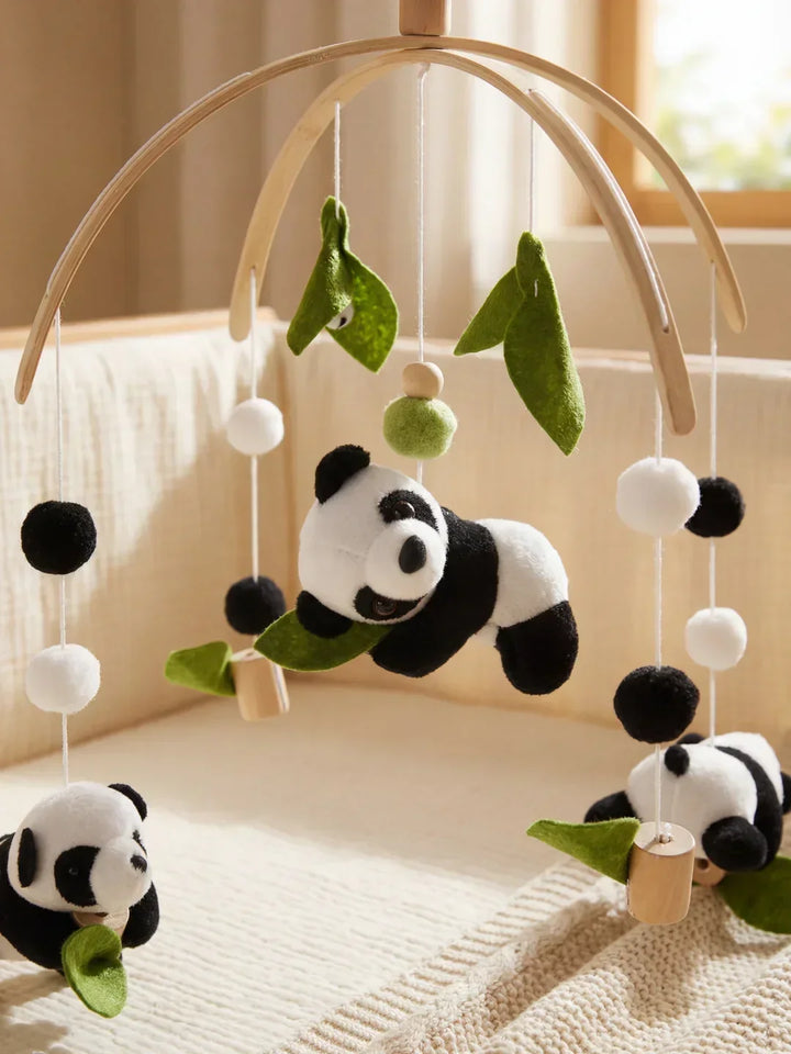 Móvil de madera para cuna, juguete sensorial que calma al bebé.