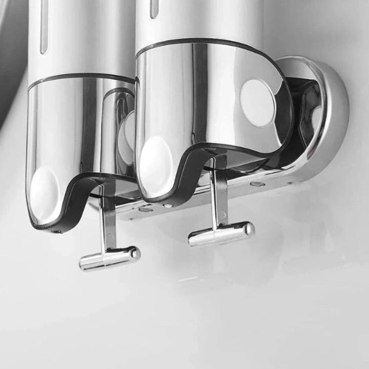 Estilizado dispensador de jabón para pared, acero inoxidable, ideal cocina.