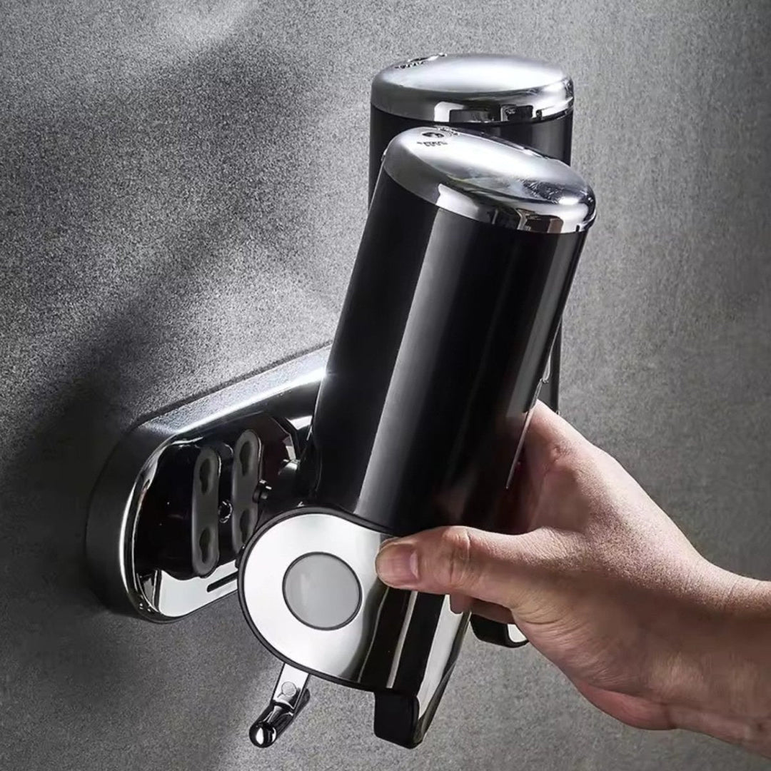 Dispensador jabón líquido acero inoxidable, diseño elegante, montaje en pared.