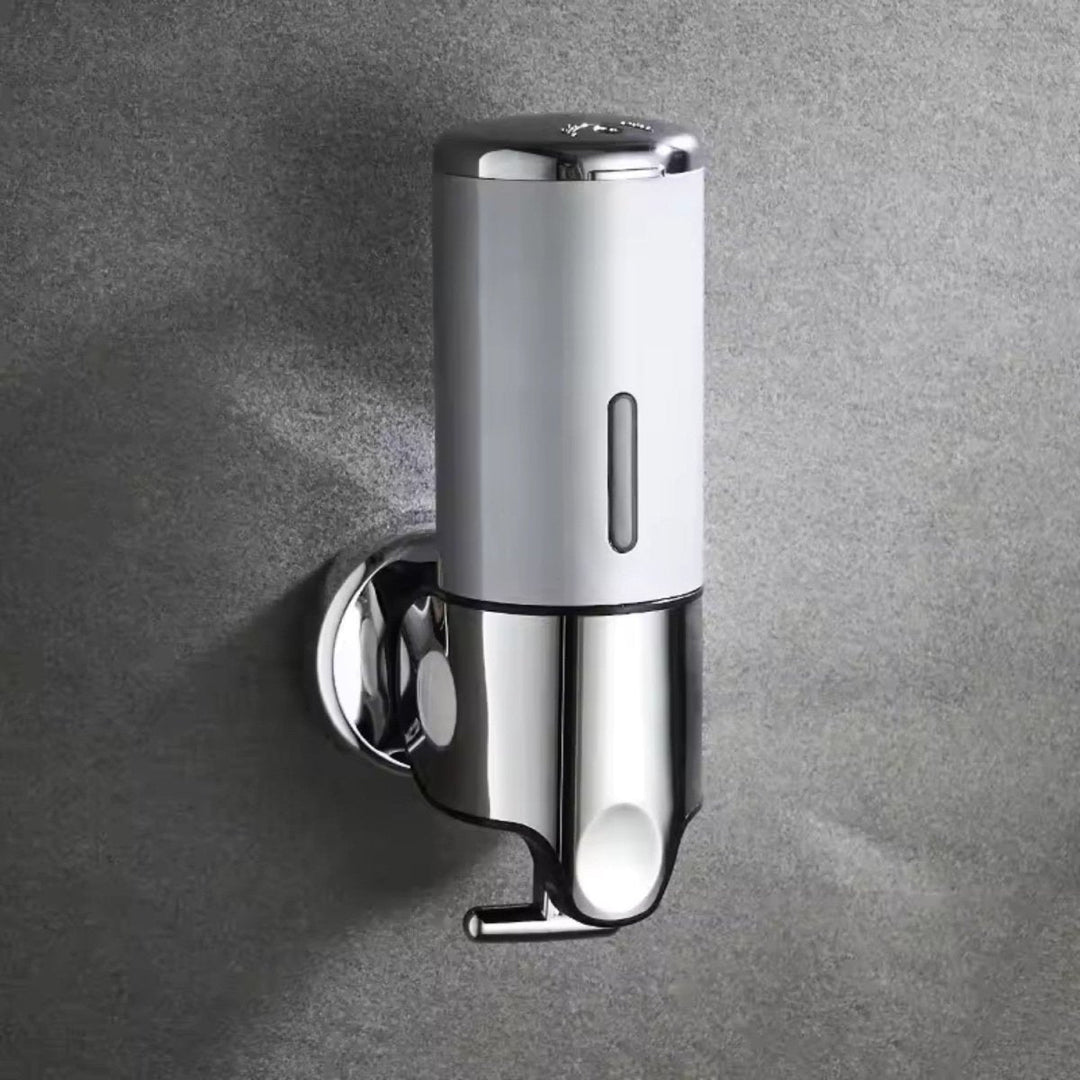 Elegante dispensador de jabón de pared, acero inoxidable, para ambientes modernos.