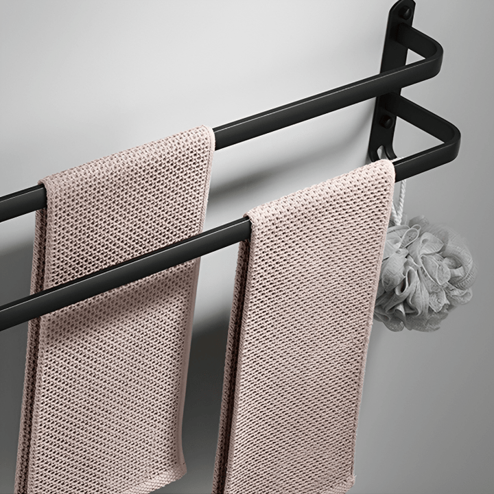 Soporte de toallas flotante de aluminio para baño, ofrece organización eficiente y un estilo moderno.