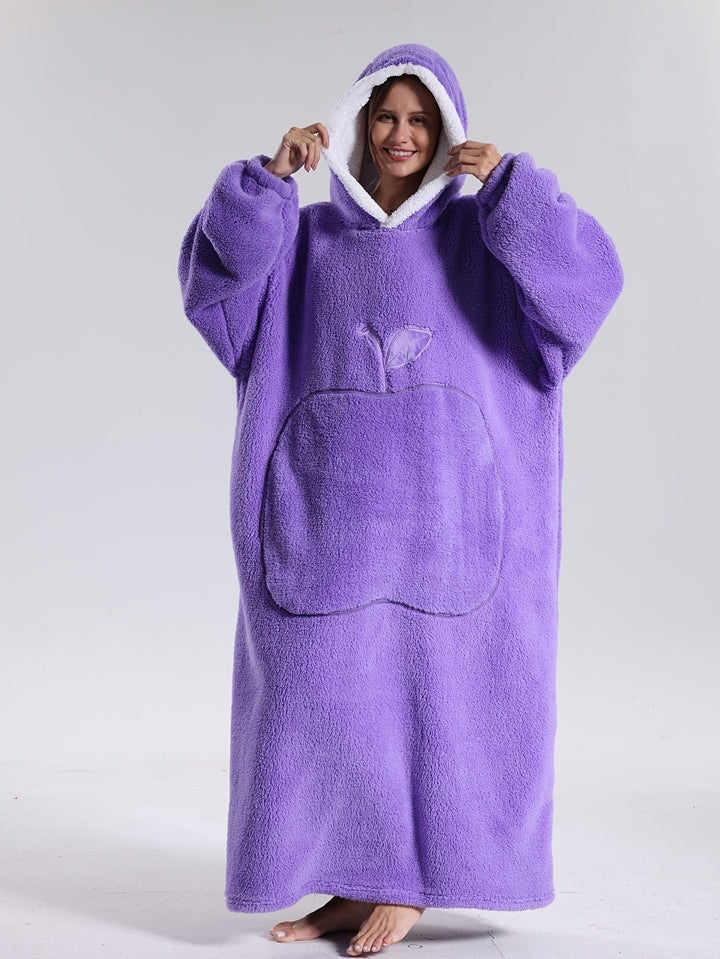 Comodidad asegurada con esta manta tipo sudadera, capucha y mangas, perfecta para toda la familia.