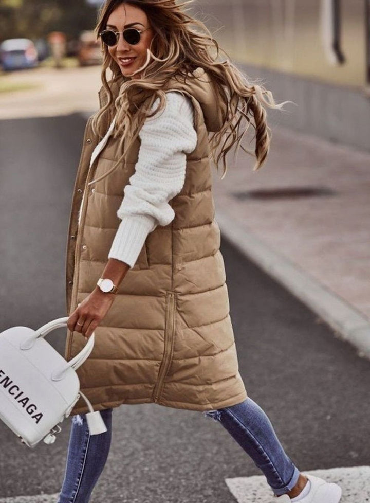 Chaleco largo sin mangas con capucha, acolchado para mujer. Prenda de abrigo casual, cómoda y ligera para invierno.