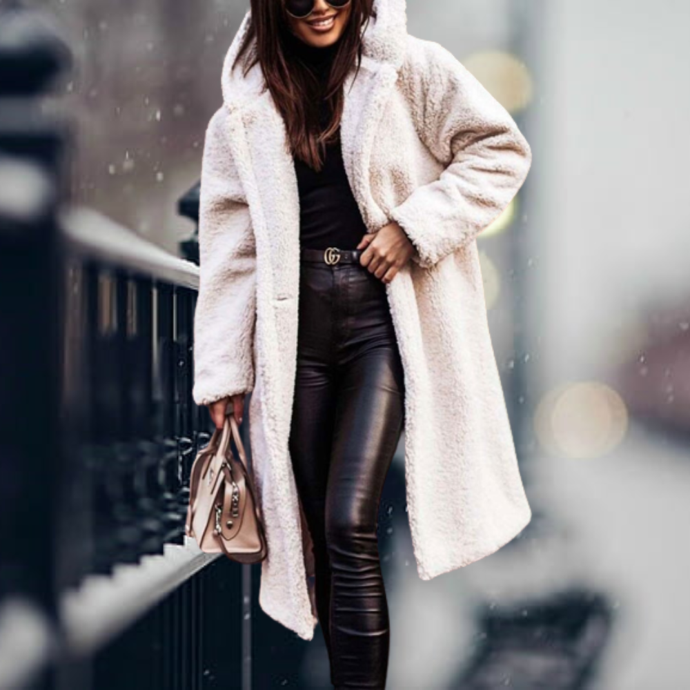 Abrigo de invierno para mujer con diseño acolchado, ofreciendo calidez y un look moderno. [[lstfy-media:4]]