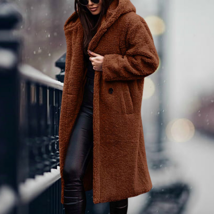 Abrigo largo de invierno para mujer, elegante y cálido, perfecto para protegerse del frío intenso. [[lstfy-media:6]]