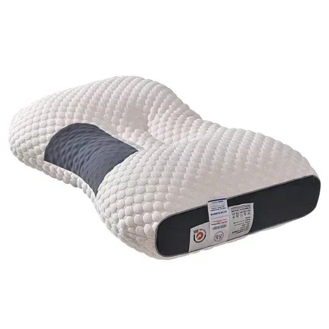 Almohada ergonómica para salud postural. Proporciona soporte de cuello, masaje y bienestar en el dormitorio.
