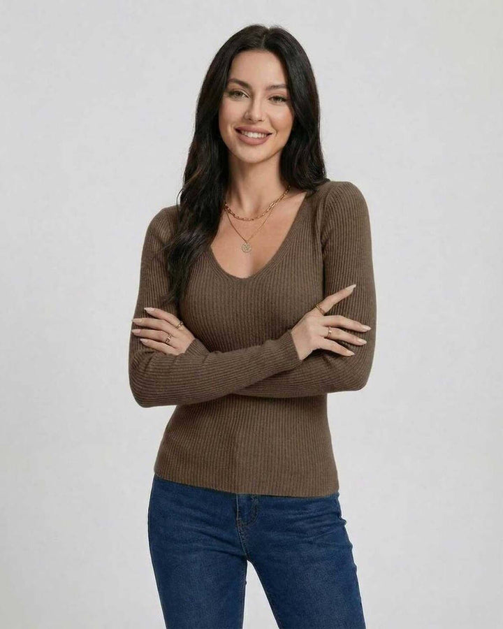 Pullover de mujer, cuello V ajustado, manga larga. Suéter perfecto para un look de oficina o casual chic.