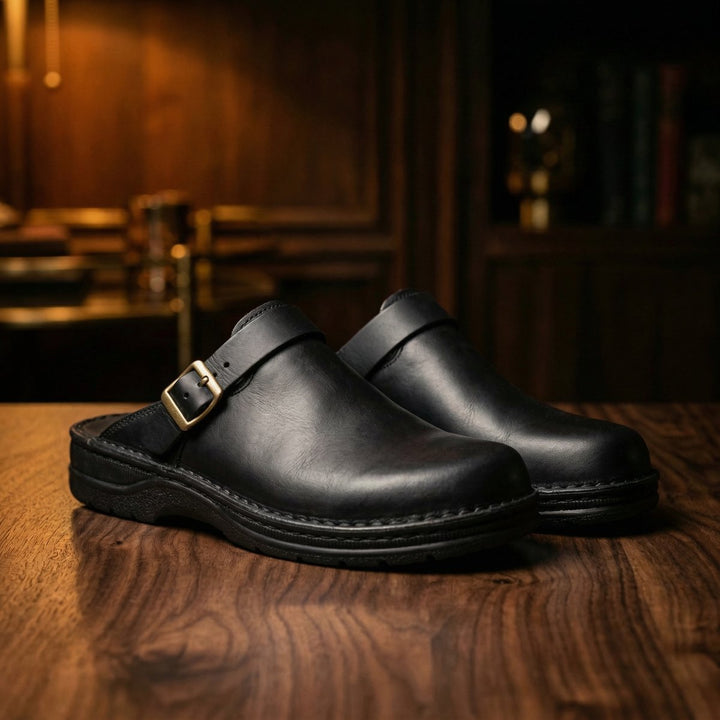 Zuecos negros cómodos sin cordones para mujer, ideales para estilo casual diario. Calzado ligero y versátil.