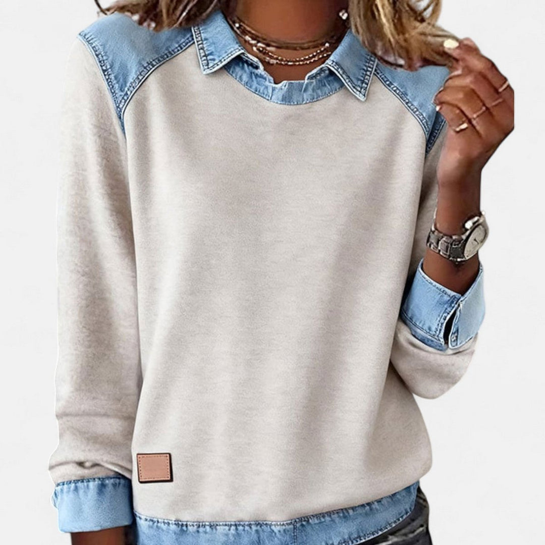 Suéter moderno Isabella para mujer, manga larga, cuello contrastante, pieza clave de moda actual.