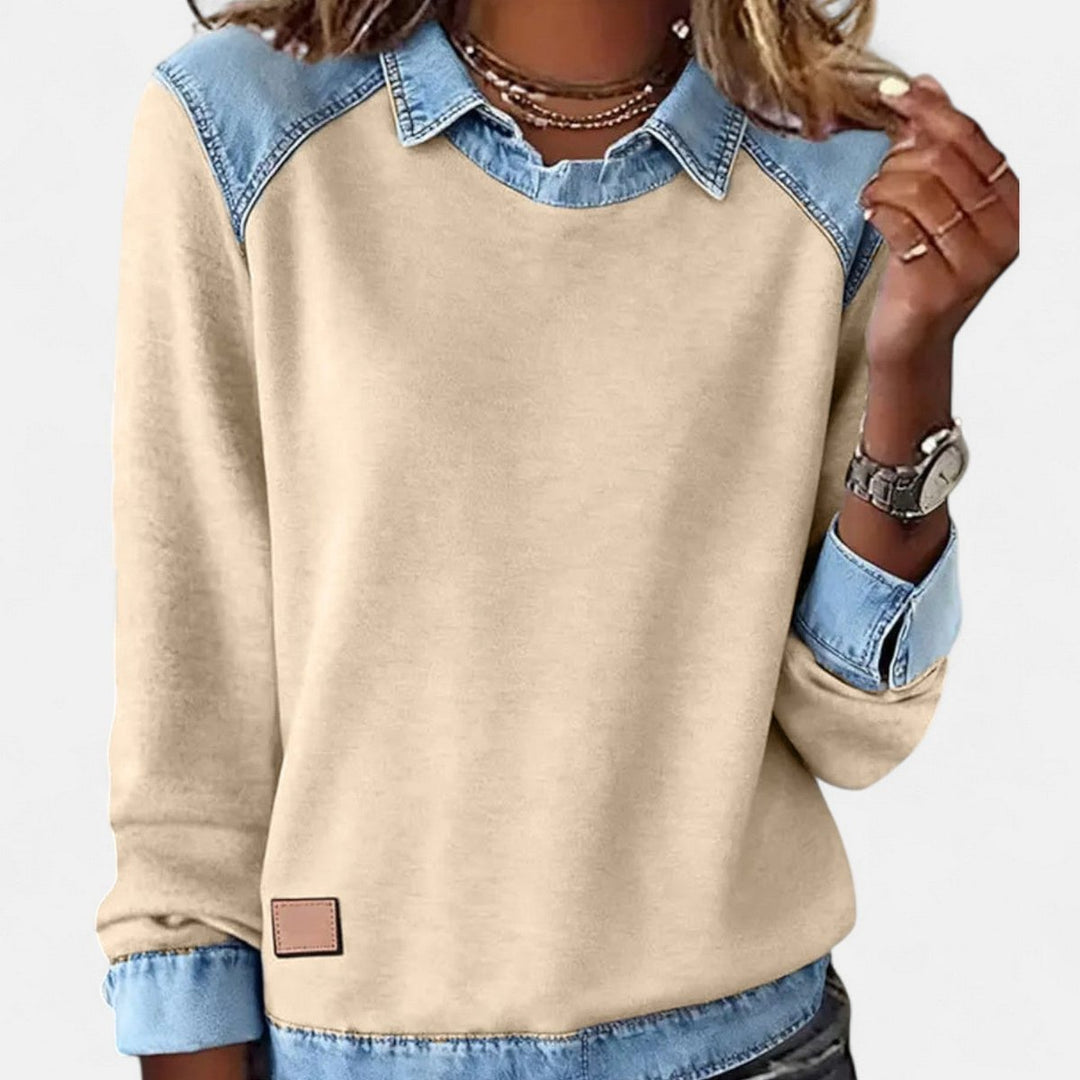 Suéter de moda Isabella para mujer, manga larga, cuello contrastante, estilo único y contemporáneo.