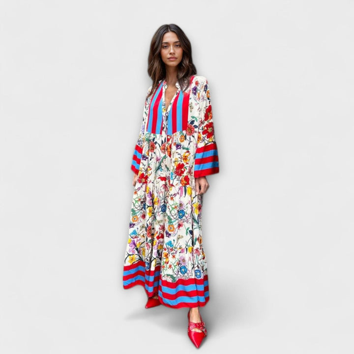 Vestido maxi fluido de mujer con estampado abstracto único, estilo bohemio. Elegante para verano, playa y eventos casuales.