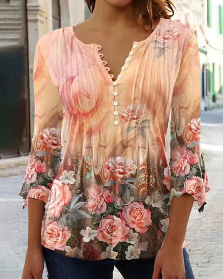 Blusa de mujer floral, ligera y con cuello Henley, ideal para días de verano.