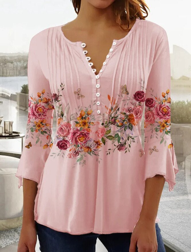 Blusa de mujer floral con cuello Henley, cómoda y fresca para el verano.