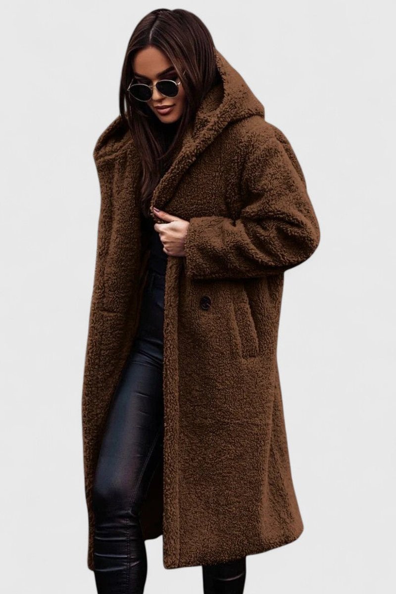 Abrigo largo de mujer, versátil para el invierno. Pieza clave de outwear, combina elegancia y calidez.