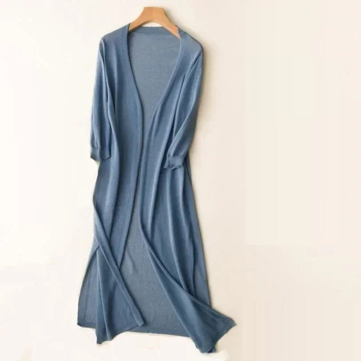 Elegante cárdigan abierto de punto ligero para mujer. Largo y versátil, perfecto para cualquier ocasión.