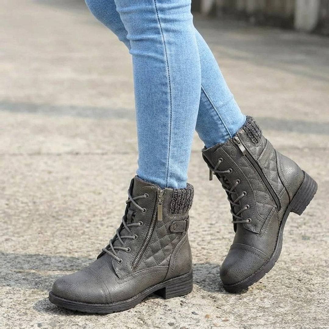 Elegantes botines acolchados de mujer con cordones y cremallera, estilo y confort garantizados.