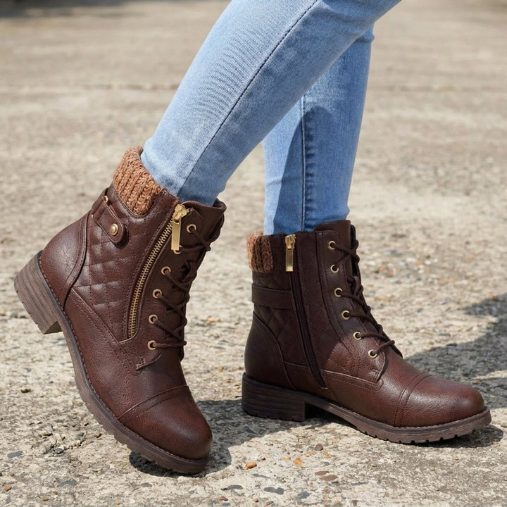 Botas de mujer con cordones y cremallera, acolchadas para máximo confort en climas fríos.