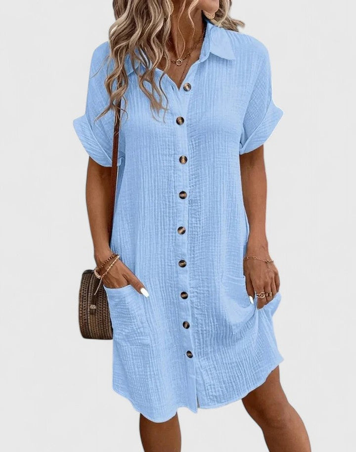Vestido camisero de mujer, corte holgado, tejido fresco para un verano cómodo y con estilo elegante.