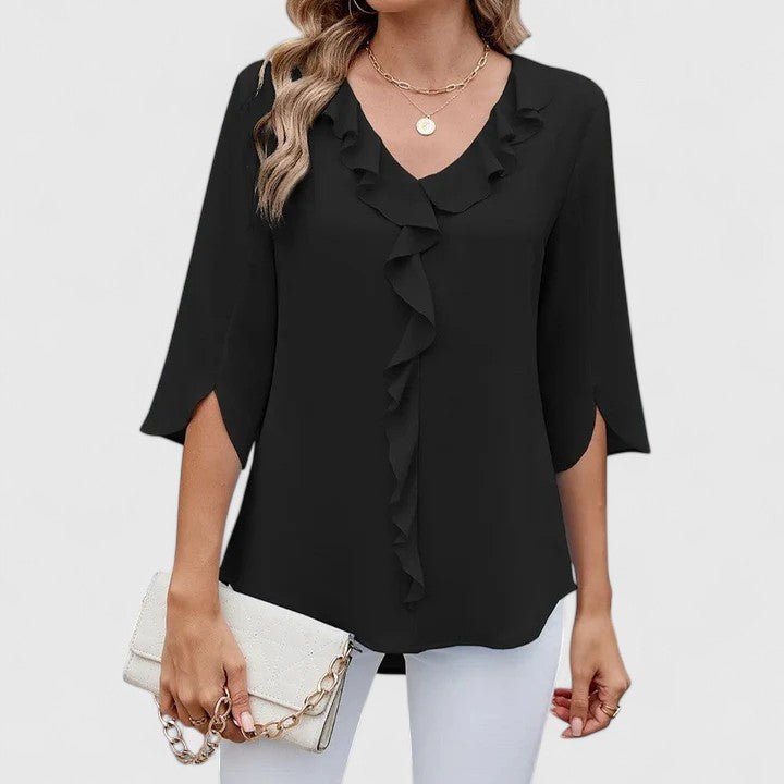 Top de mujer con escote en V, manga media y volantes. Blusa casual y versátil para moda femenina.