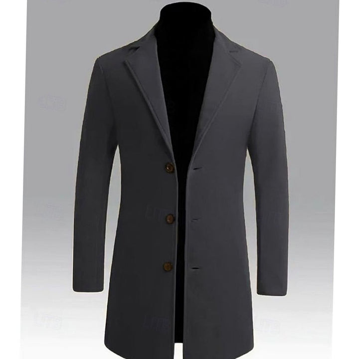 Abrigo clásico de hombre, elegante y versátil. Complemento perfecto para estilo urbano o formal en invierno.