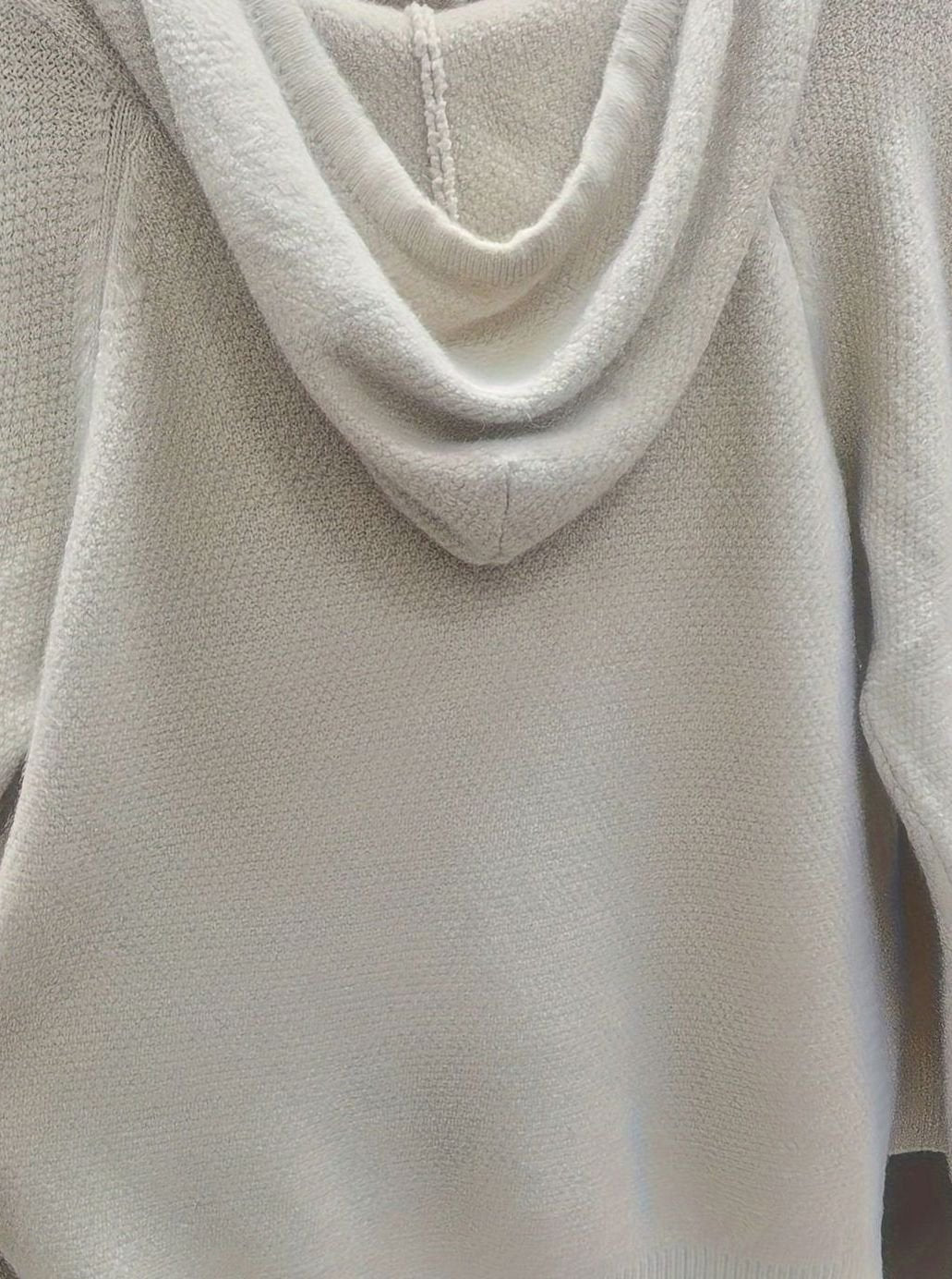 Jersey cárdigan de punto suave para mujer, con capucha y cremallera, diseño relajado y versátil.
