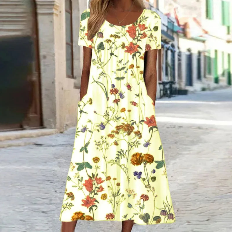 Vestido fluido floral de verano con mangas cortas, cómodo, fresco y con estampado vibrante.