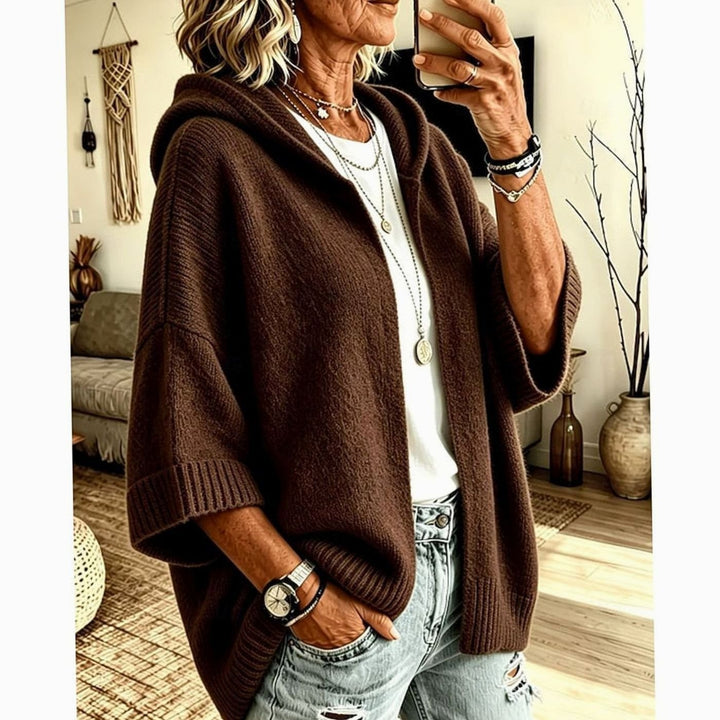 Cárdigan mujer con capucha tejido suave, estilo relajado y abierto. Ideal para entretiempo.