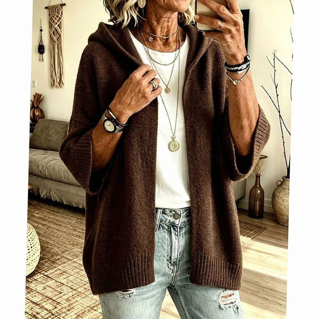 Abrigo cárdigan abierto de punto para mujer, con capucha. Diseño oversize cómodo y moderno.