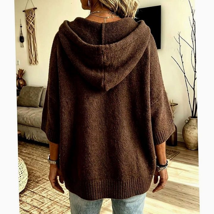 Cárdigan de mujer con capucha y diseño abierto, tejido suave de punto, perfecto para moda entretiempo.
