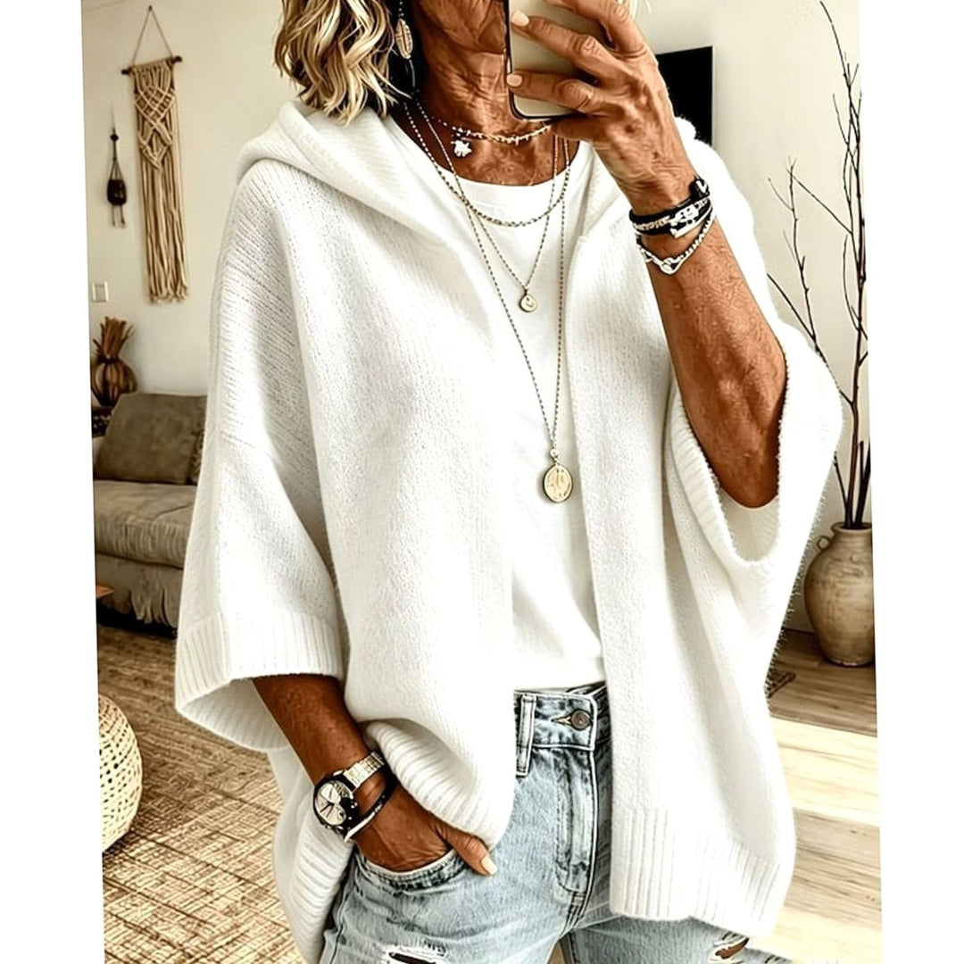 Cárdigan oversize de mujer con capucha, diseño abierto y tejido suave. Comodidad y estilo relajado.