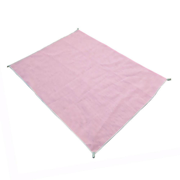 Toalla de camping y picnic grande, anti-arena. Ligera y portátil para aventuras al aire libre en familia.