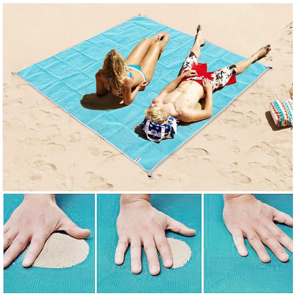 Toalla de playa anti-arena grande, ideal para familia y picnic, disponible en varios colores.