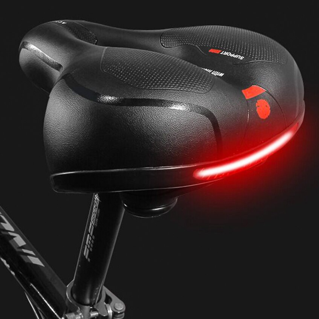Sillín de bicicleta ergonómico unisex para máxima comodidad en ciclismo, ideal para viajes largos.
